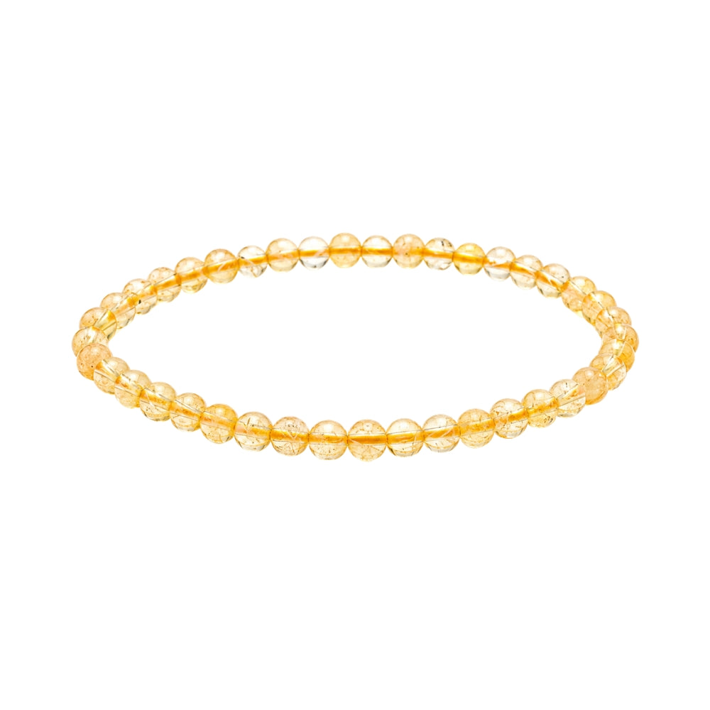 A beaded stretch bracelet made of Citrine beads with a warm yellow-gold internal tint, shown on a plain white background.