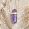 Amethyst Double Terminated Crystal Necklace with a faceted natural amethyst point and silver chain.