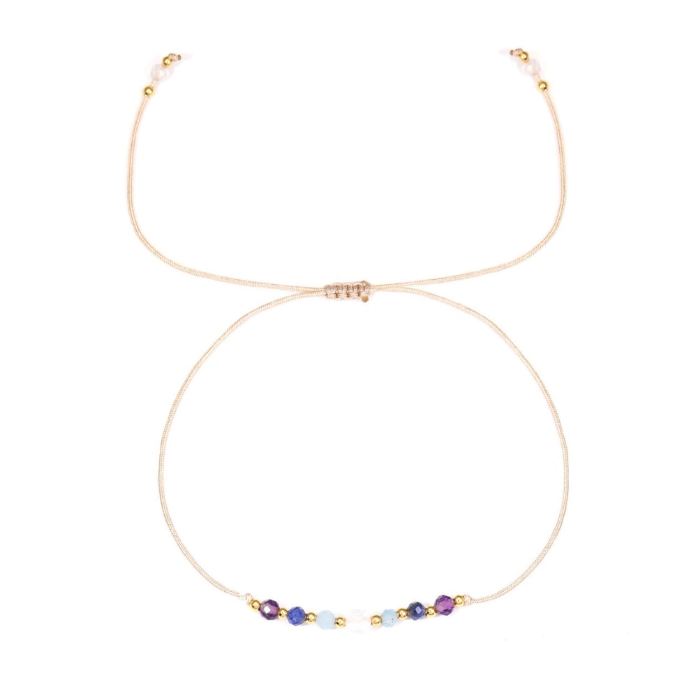 Bracelet - Zodiac, Pisces with small colorful beads on a white background