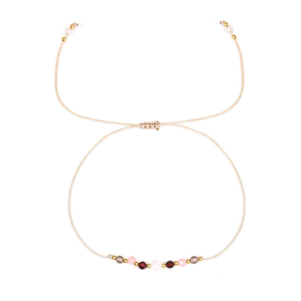 Capricorn Bracelet with small beads on a white background