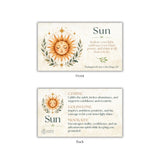 Front and back views of a square card or box design featuring a sun illustration and the word 'Sun,' with inspirational text and color names including citrine, goldstone, and mookaite on a white background.