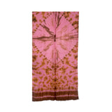 Tie-dye scarf with pink and brown pattern on a white background