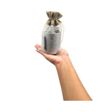 Hand holding a Zodiac Set - Cancer on a white background