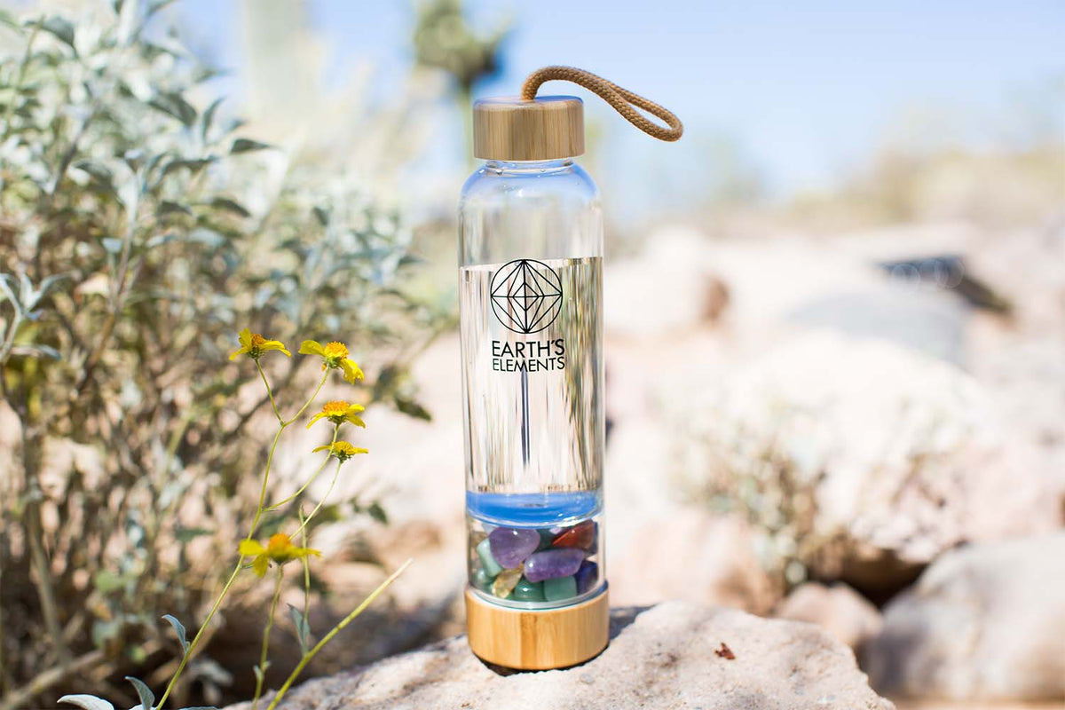 Crystal water bottle on a rock