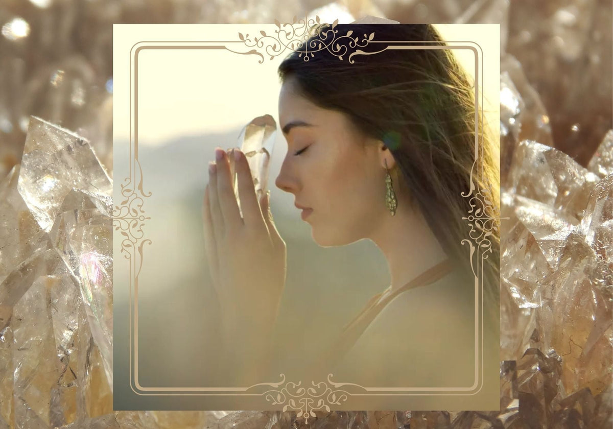 woman holding a clear quartz crystal against her forehead