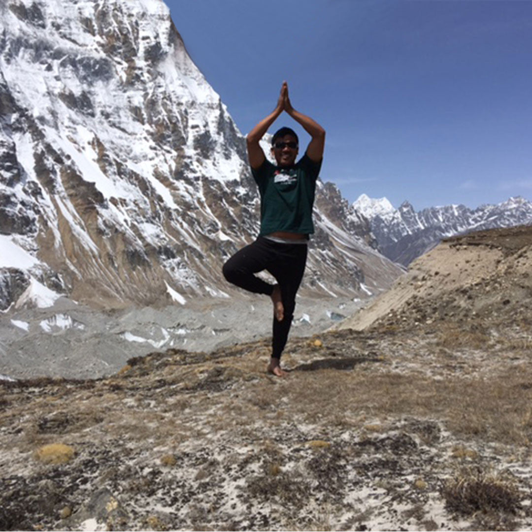 Hem standing in tree pose