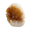 Geode with brown interior and white exterior on a white background