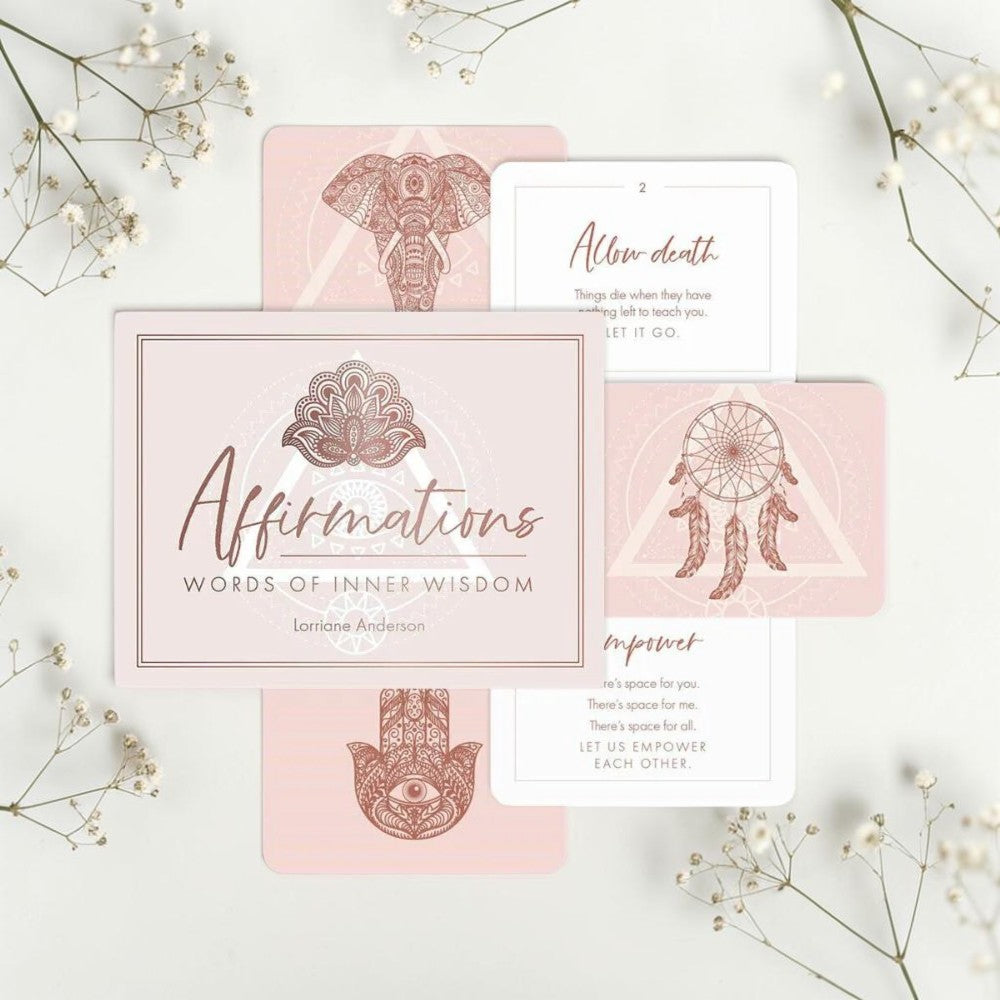 Set of affirmation cards with decorative designs on a light background