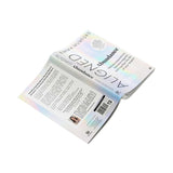 An open book titled 'Aligned' by Emma Mumford, displayed against a solid white background. The book features a white cover with a subtle iridescent rainbow sheen and black typography.