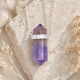 Amethyst Double Terminated Crystal Necklace with a faceted natural amethyst point and silver chain.