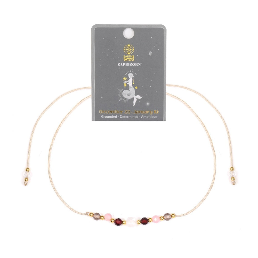 Capricorn Bracelet with small beads on a white background