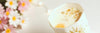 Sun candle with flowers in the background