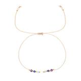 Bracelet - Zodiac, Pisces with small colorful beads on a white background