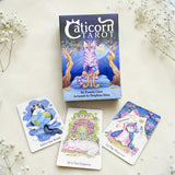 Caticorn Tarot cards with a box on a light background