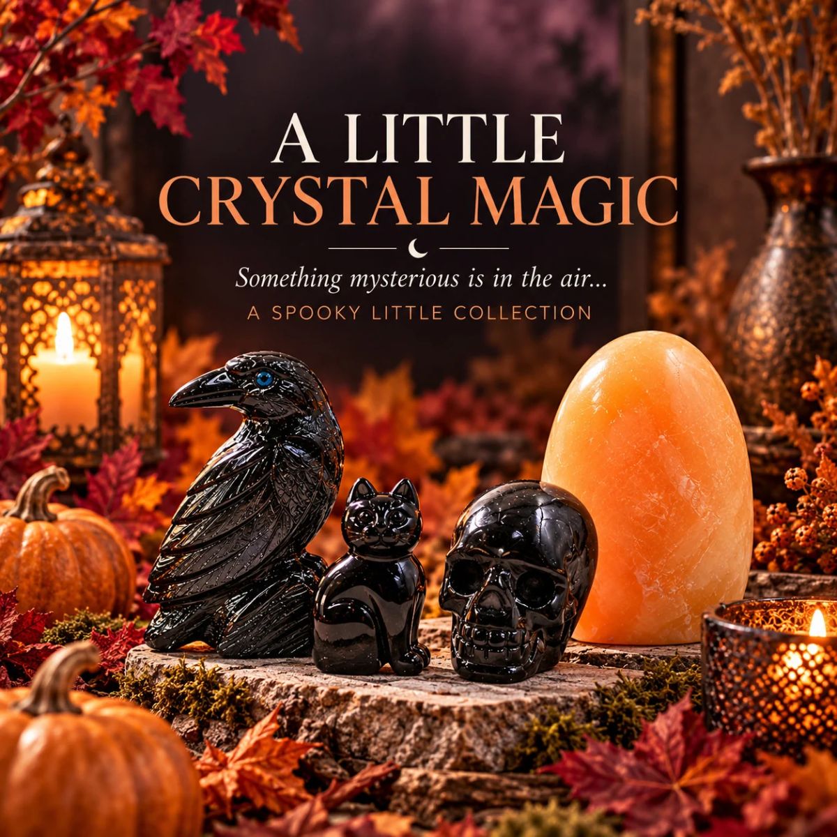Black Onyx Raven and Cat, Black Obsidian Skull, and Orange Calcite crystal displayed with pumpkins, autumn leaves, and candlelight in a spooky Halloween scene for Earths Elements.