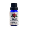Bottle of rose essential oil with a black cap on a white background