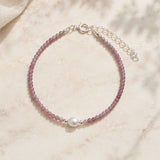 Pink Tourmaline bracelet with freshwater pearl accent.