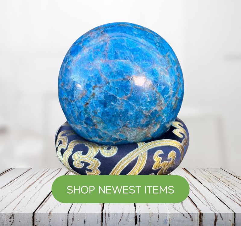 Earths Elements crystals, candles, and wellness products displayed together