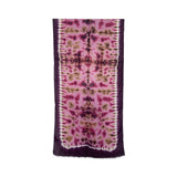 Purple and pink patterned scarf on a white background