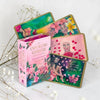 Set of 'The Unfurling Goddess' oracle cards with a box on a light background