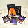 Zodiac tarot cards with colorful illustrations on a light background