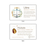 Two cards showing the front and back of a Libra zodiac card with astrological information and Mookaite stone details.